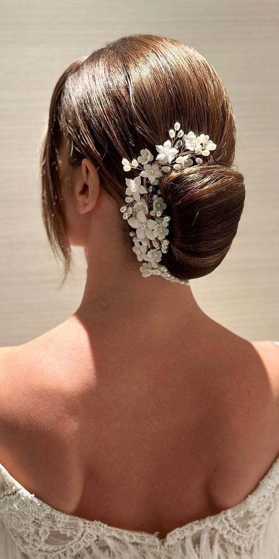 Hairdos to Steal the Spotlight on Every Special Occasion : Elegant Bridal Chignon with Hair Accessories