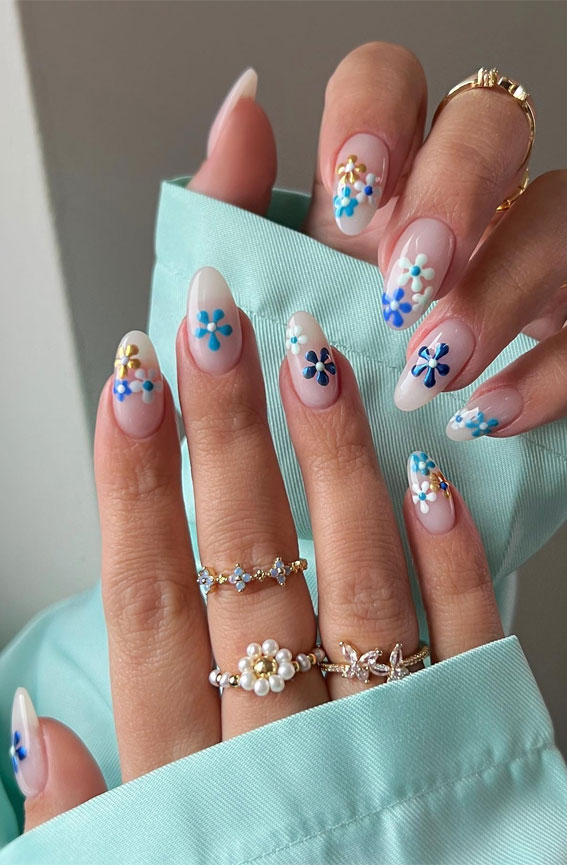 42 Cute Spring Nail Art Inspirations : Milky mani + blue flowers