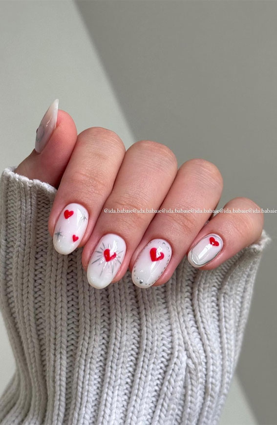 30+ Love-Inspired Nail Aesthetics : Red Heart White Nails with Silver Details