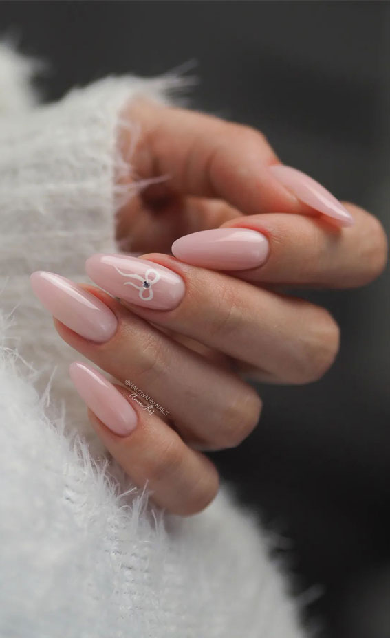 40 Spring Nail Ideas to Brighten Your Look : Nude Pink Nails with Bow