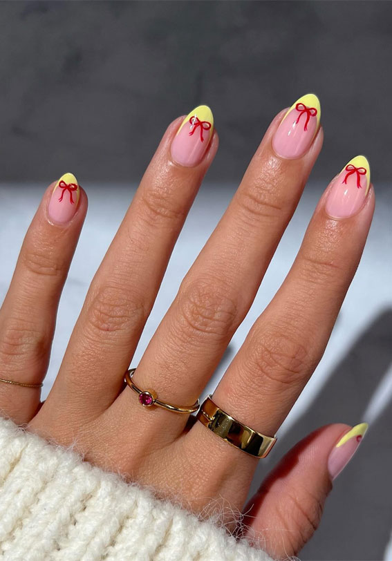 Revamp Your Nails with 17 Coloured French Tip Ideas : Yellow Tips and Red Bow Accents