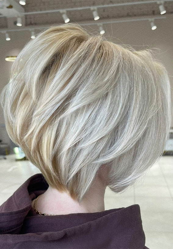 27 Exploring Stacked Haircuts for Modern Style : Champagne Blonde Stacked Haircut