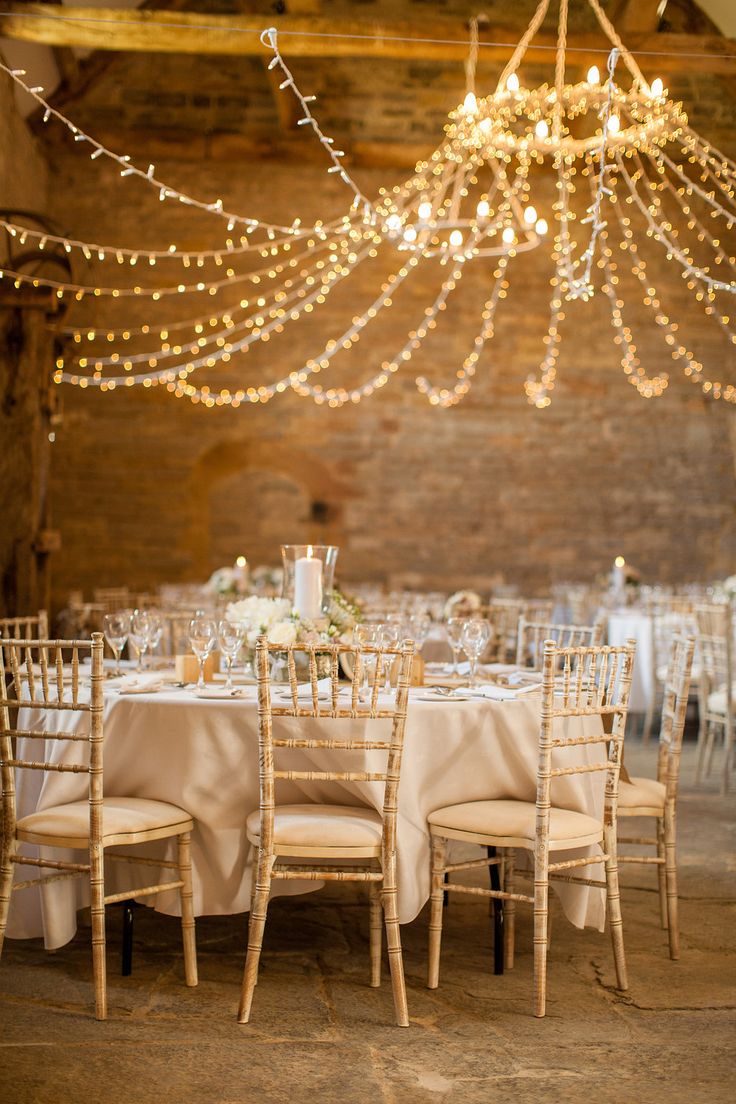 Rustic chic wedding - Twinkle fairy light chandelier barn wedding : fabmood.com