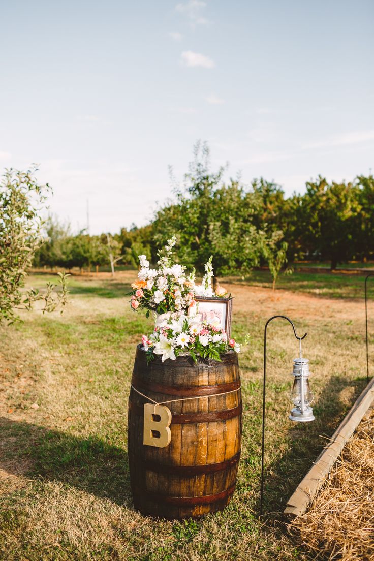 Wine-barrel - Rustic Wedding in The Peach Orchard | Photography : marymargaretsmith.com | https://www.fabmood.com/a-cozy-fall-wedding-in-the-peach-orchard #peach #fallwedding