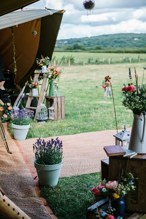 Pots of wildflowers on the tables - boho wedding | fabmood.com