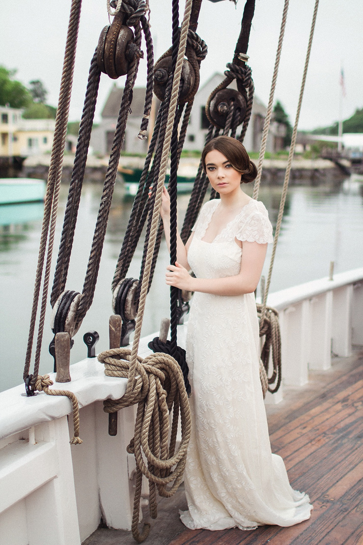Short sleeves wedding gown from Saja Wedding - Nautical Wedding Inspiration shoot | justinabilodeauphotography.com | #weddinginspiration on fabmood.com