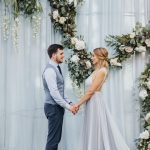 White flowers + Greenery garland and draping fabric wedding backdrop wedding ceremony decorations | fabmood.com #weddingdecor #weddingbackdrop
