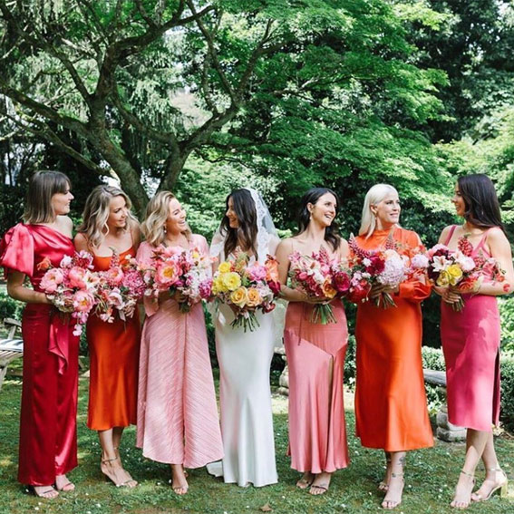 coral wedding attire, bride and bridesmaids , coral mix and match bridesmaid dresses