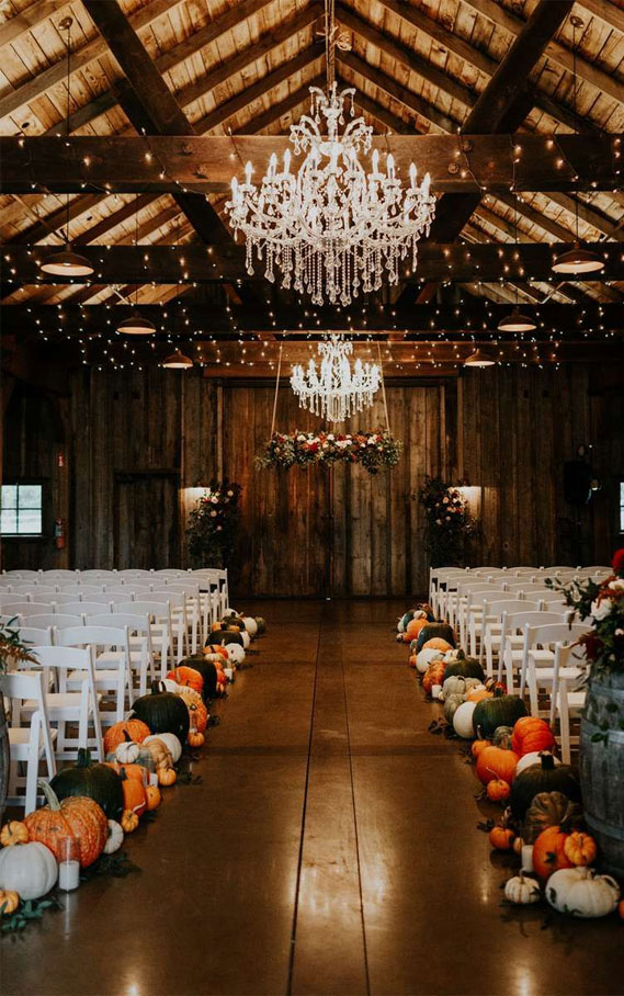 cozy wedding decoration ideas, fall wedding ideas #fallwedding , candles wedding decors, fall wedding decor pumpkins, pumpkin wedding theme, pumpkins wedding decorations, wedding aisle decor pumpkins