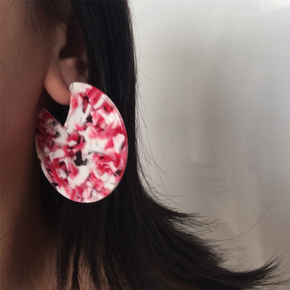 white and red earrings, round earrings