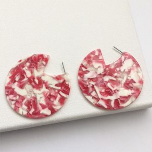 white and red earrings, round earrings