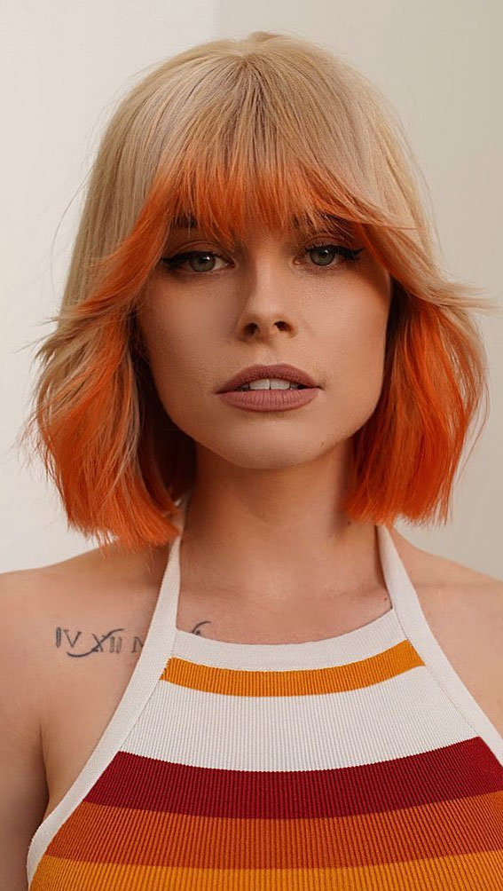 retro bob haircut, blonde and orange hair color, two tone hair color for blonde