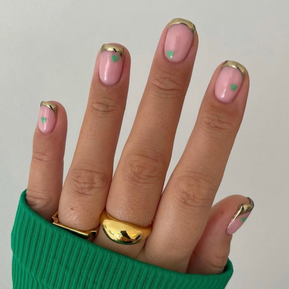 gold tip nails with green hearts, minimalist valentines nails, simple love heart nails, valentine's day nails 2022