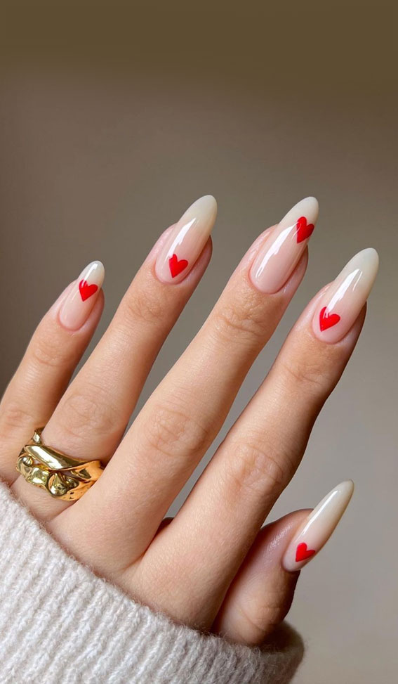 minimalist nails with red hearts, valentine's day nails 2022, heart nails 2021, love heart nails, gel nails for valentines day, valentine nails, valentine's day nail designs, pink nails, french tip valentine nails, heart tip nails, february nails 2021, valentines day nails 2021 almond
