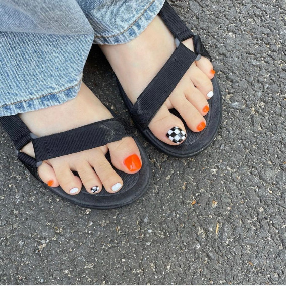 50 Cute Summer Toe Nails for 2022 : Orange, Black and White Checkerboard
