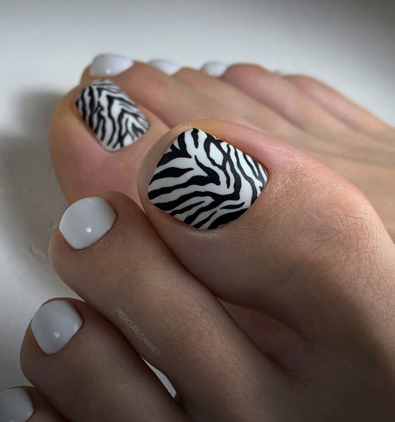 50 Trendy Pedicure Designs To Dress Up Your Toe Nails : Black and White Zebra Print Toe Nails