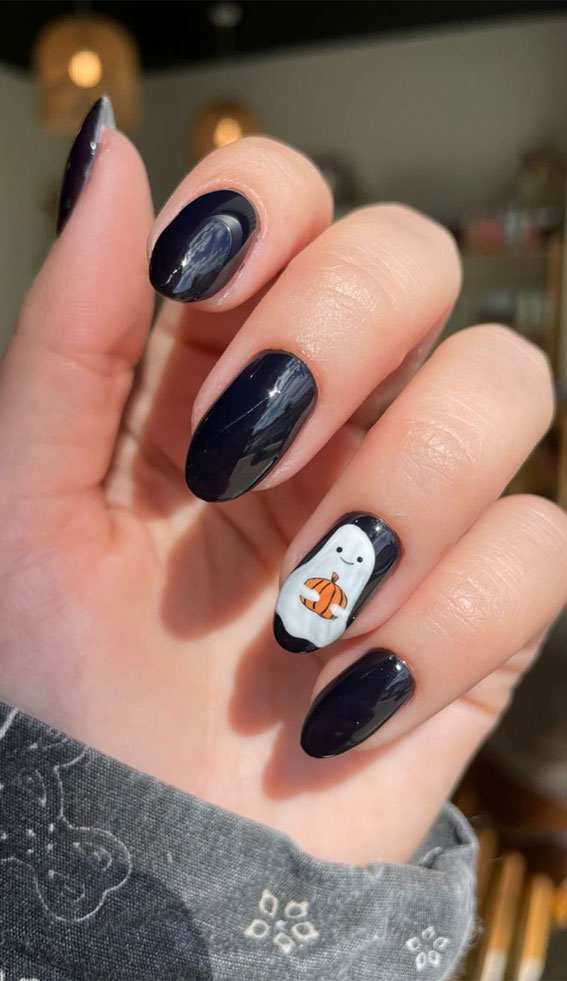 50 Cute Spooky Halloween Nail Ideas : Happy ghost on black nails