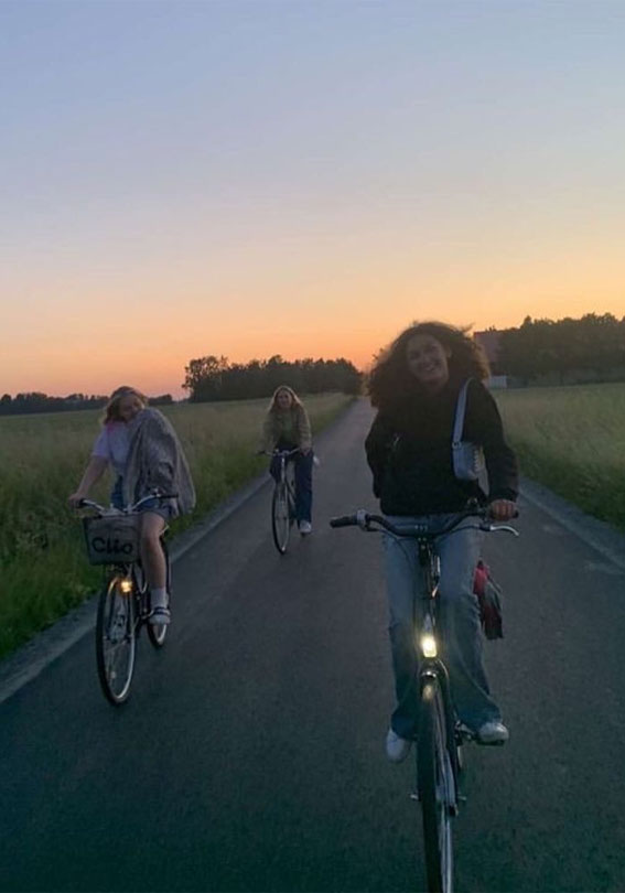 Embrace the Beauty of an Aesthetic Summer : Riding bike with friends in the evening