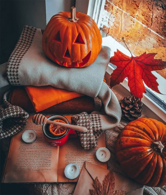 50 Visual Journeys Through Fall’s Aesthetics : Carved Pumpkin + Spice Drink & Cozy Sweater