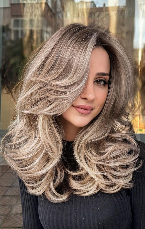 Blonde Bombshell: 12 Stunning Blonde Blowout Hairstyles for Light Locks