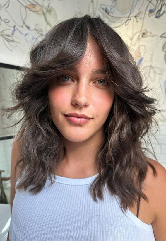 Mid length wolf haircut with layers, wolf cut hair ideas, medium length haircut, medium length wolf haircut, Mid length wolf haircut female, Mid length wolf haircut straight hair, wolf cut mid length hair, wolf cut women, Mid length wolf haircut curly hair